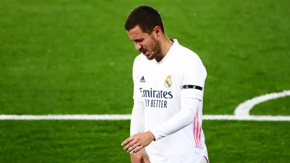 FILE PHOTO: Soccer Football - La Liga Santander - Real Madrid v Deportivo Alaves - Estadio Alfredo Di Stefano, Madrid, Spain - November 28, 2020 Real Madrid's Eden Hazard walks off after sustaining an injury REUTERS/Javier Barbancho/File Photo