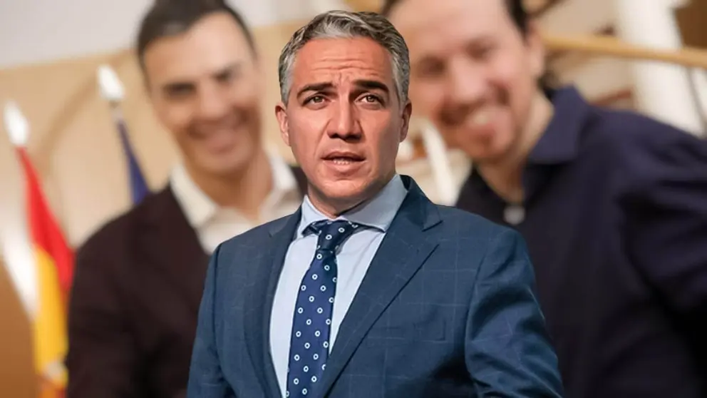 El&iacute;as Bendodo. De fondo Pedro S&aacute;nchez y Pablo Iglesias, presidente y vicepresidente del Gobierno de Espa&ntilde;a