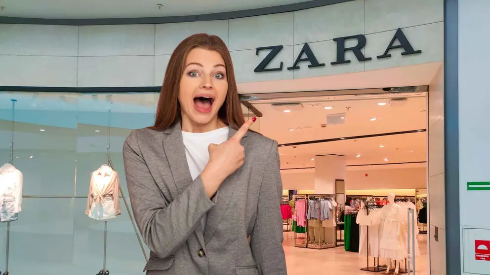 Una mujer a la moda frente a una tienda de Zara