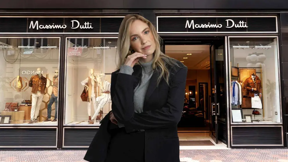 Una mujer a la moda frente a una tienda de Massimo Dutti