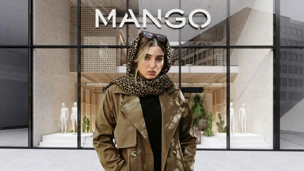Una mujer a la moda frente a una tienda de Mango