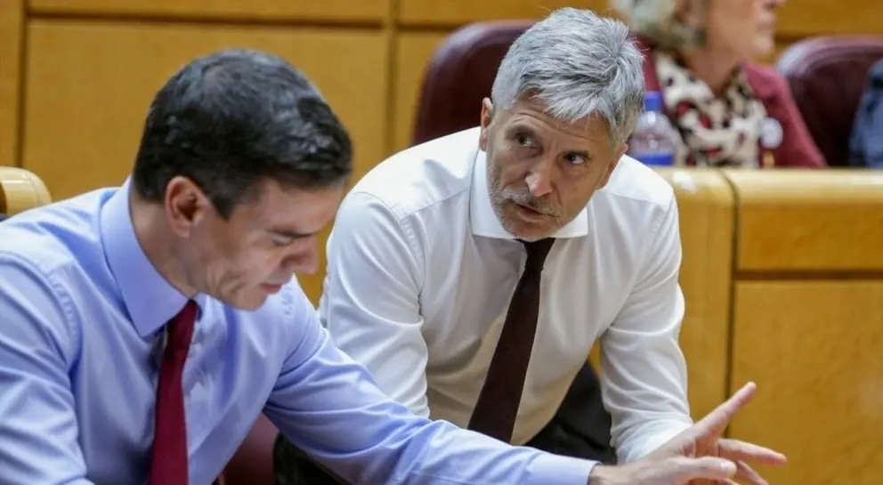 Pedro S&aacute;nchez y Fernando Grande Marlaska