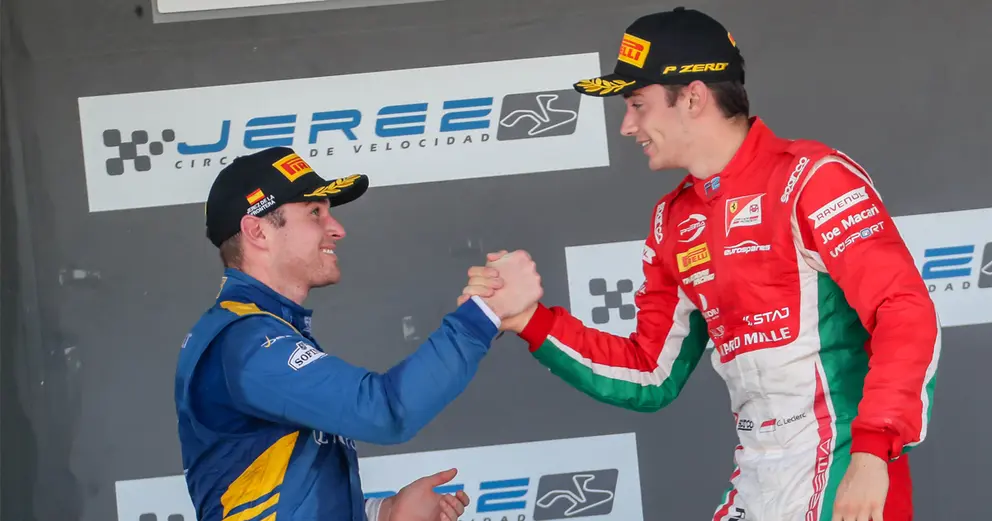 Charles LECLERC da la mano a Oliver ROWLAND