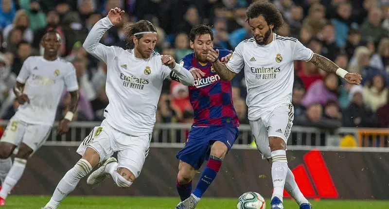 01 March 2020, Spain, Madrid: Real Madrid's Sergio Ramos (L) and teammate Marcelo (R) battle for the ball with Barcelona's Lionel Messi during the Spanish Primera Division soccer match between Real Madrid and Barcelona at the Santiago Bernabeu Stadium. Photo: Manu Reino/SOPA Images via ZUMA Wire/dpa


01/03/2020 ONLY FOR USE IN SPAIN