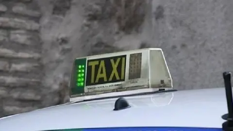 Una taxi en una foto de archivo