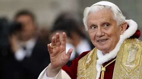 Pope Benedict XVI waves to faithful during his annual prayer at the Immaculate Conception statue at Piazza di Spagna (Spanish Steps) in Rome on December 8, 2011 on the day dedicated to virgin Mary. Pope Benedict reflected earlier in the day Solemnity of the Immaculate Conception in his Angelus address to the faithful gathered in St. Peter's Square at The Vatican.  AFP PHOTO / FILIPPO MONTEFORTE (Photo credit should read FILIPPO MONTEFORTE/AFP/Getty Images)