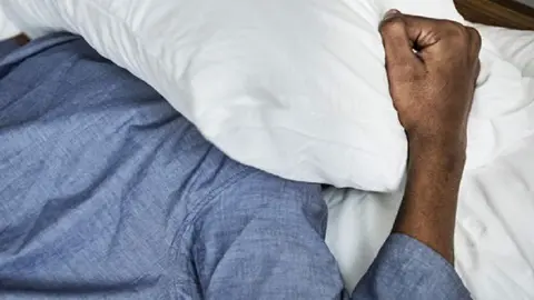 A man with sleeping issue