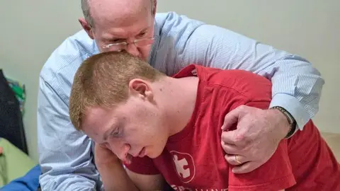 Mark y Barbara Bucknam, padres de Janice y John Land, gemelos adultos con autismo | Evelyn Hockstein | The Washington Post