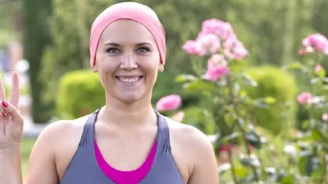woman with cancer smiling fighter