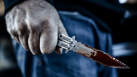 Asesino cuchillo | Imagen de Archivo