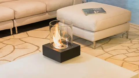 La estufa con llamas de Leroy Merlin que es muy bonita y pones encima de la mesa