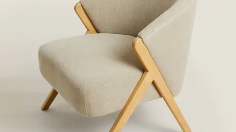 Butaca tapizada de lino