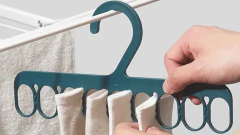 Percha con pinzas SLIBB de Ikea