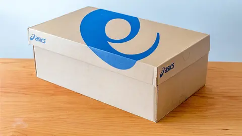 Pruszcz Gdanski, Poland - April 10, 2022: Asics shoe box. Asics is a Japanese multinational corporation which produces sports equipment designed for a wide range of sports.