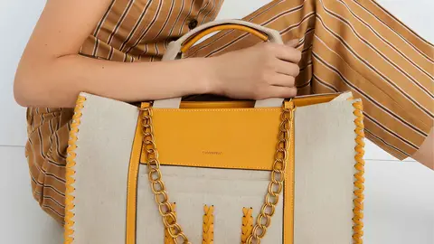 Bolso de mano grande con trenzado y detalle de la marca Tintoretto en El Corte Ingl&eacute;s