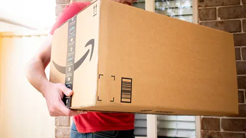 Sydney, Australia - 2021-03-08 Amazon prime big box delivered to a front door of residential building. Black Friday Cyber Monday Christmas Sale Prime Day. Amazon Flex delivery