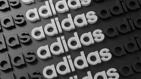 Adidas en relieve en pared