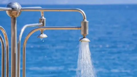 Una ducha en la playa