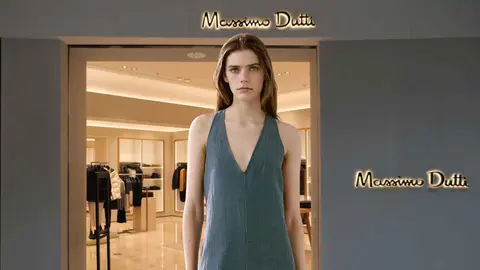 Una mujer a la moda con vestidos de Massimo Dutti
