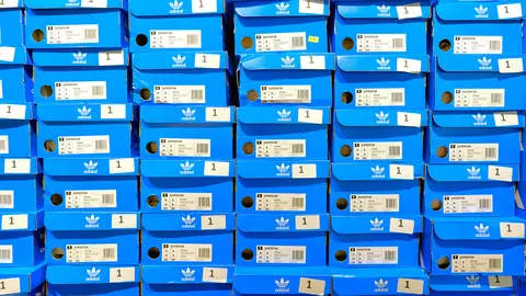 HONG KONG, CHINA - CIRCA JANUARY, 2019: stacked Adidas footwear boxes at a store at New Town Plaza shopping mall in Hong Kong.