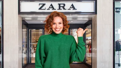 Una mujer a la moda frente a una tienda Zara