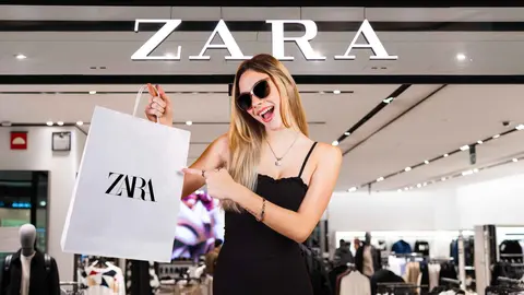 Una mujer frente a una tienda Zara