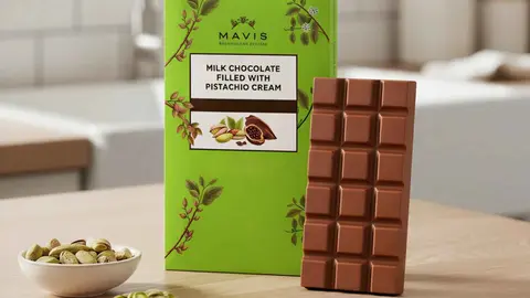 Tableta de chocolate Premium con leche rellena de crema de pistacho, Mavis de El Corte Ingl&eacute;s