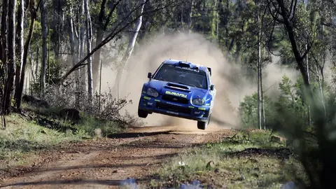 Subaru driver Petter Solberg in action on SS9 during leg one, Telstra Rally Australia 2005.