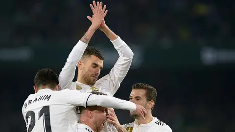 Real Madrid's Spanish midfielder Daniel Ceballos (C) celebrates after scoring a goal during the Spanish League football match between Real Betis and Real Madrid CF at the Benito Villamarin stadium in Seville on January 13, 2019. (Photo by CRISTINA QUICLER / AFP)        (Photo credit should read CRISTINA QUICLER/AFP/Getty Images)