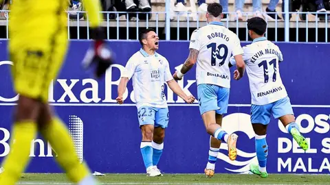 Jugadores del M&aacute;laga CF celebrando un gol del equipo