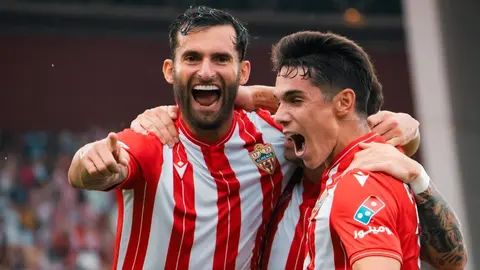 Sergio Arribas y L&eacute;o Baptistao celebran uno de los goles de la UD Almer&iacute;a ante el Racing de Santander | UDA