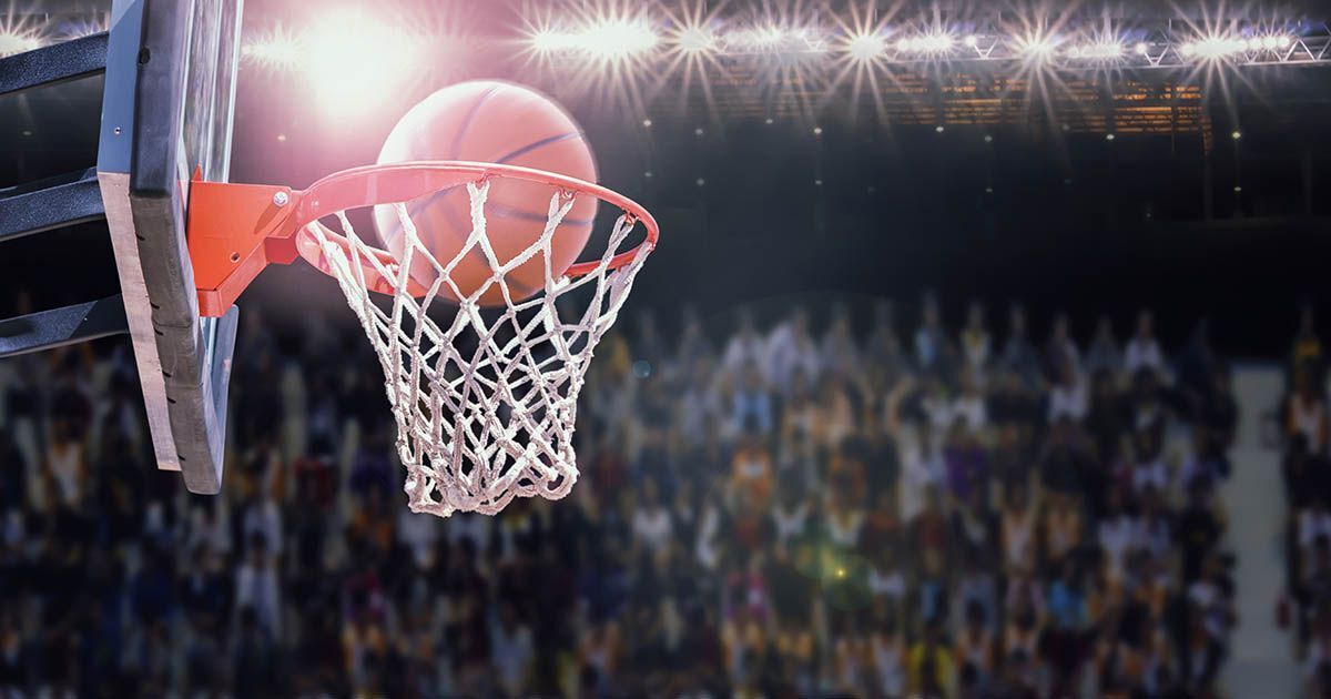 basketball scoring during match in arena