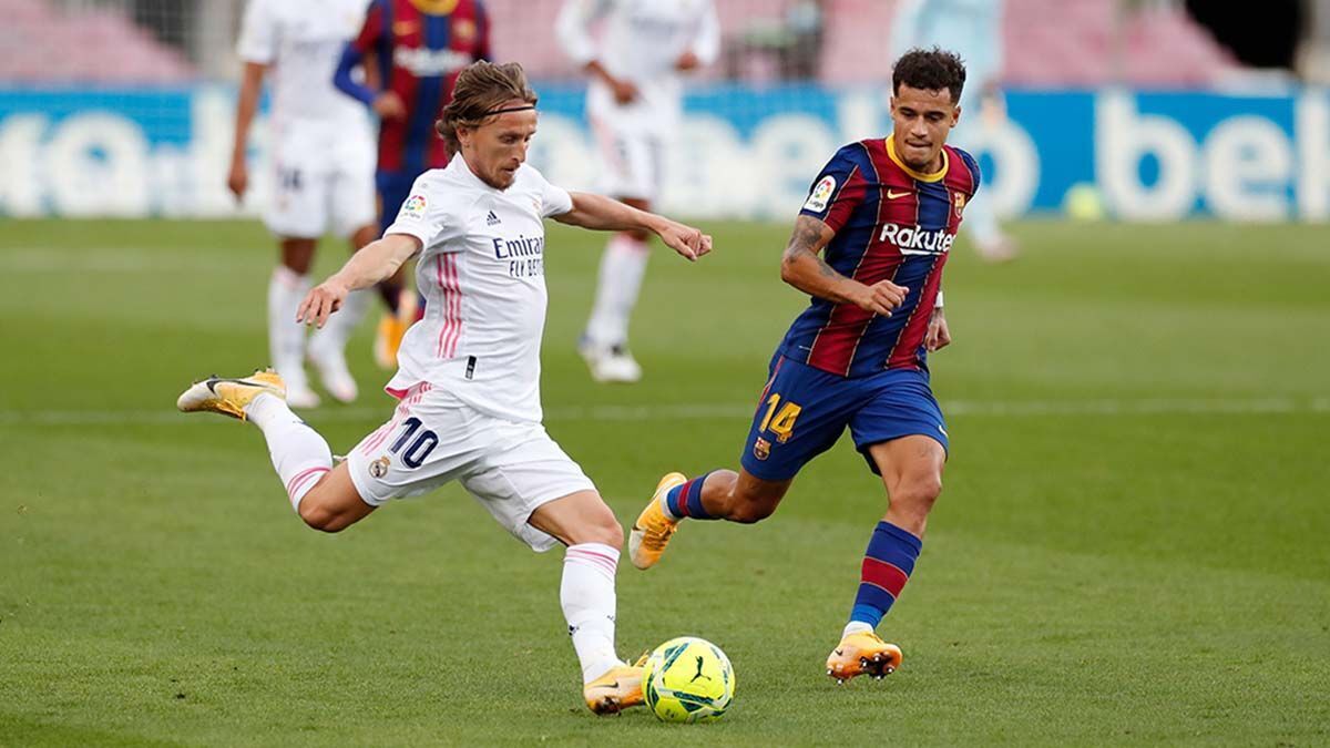 Luka Modric y Coutinho durante El Clásico
