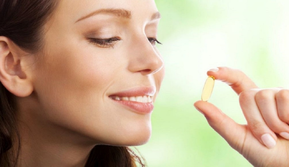 Mujer tomando Omega-3