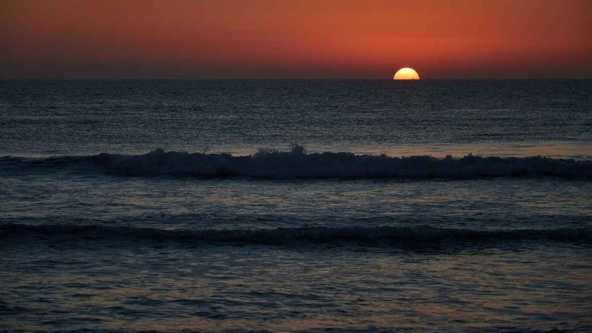 Puesta de sol en la Playa de El Palmar