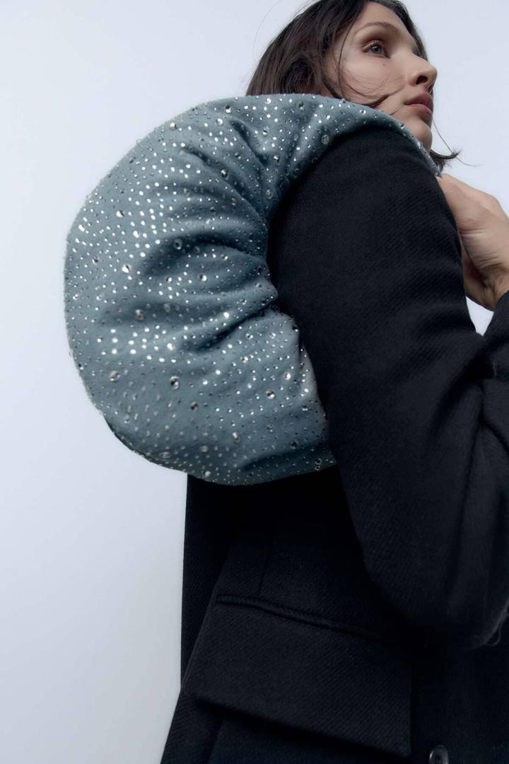 Bolso ovalado denim con brillantes