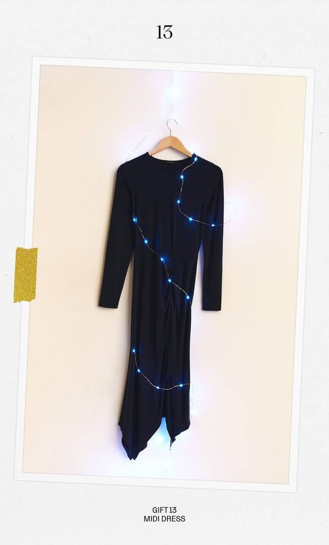 Vestido midi bajo en forma de picos de Stradivarius