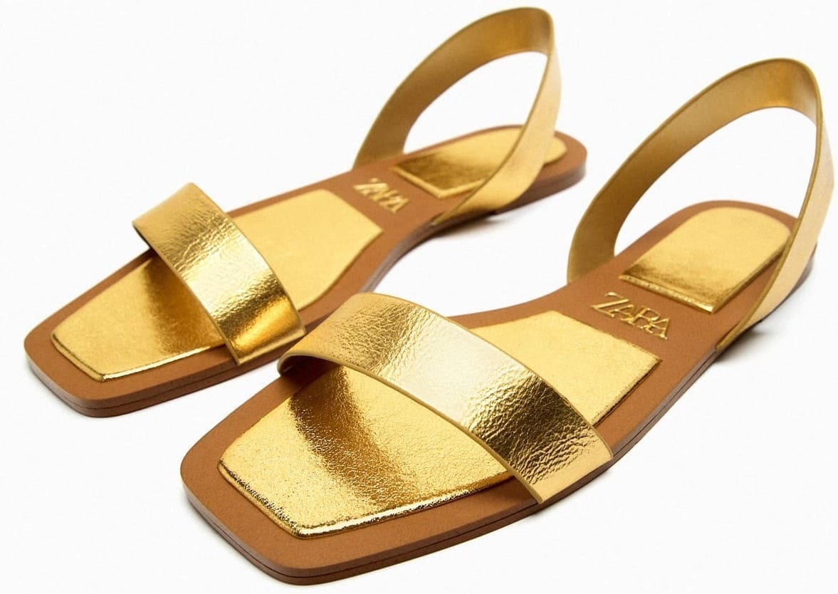 Sandalia plana de piel