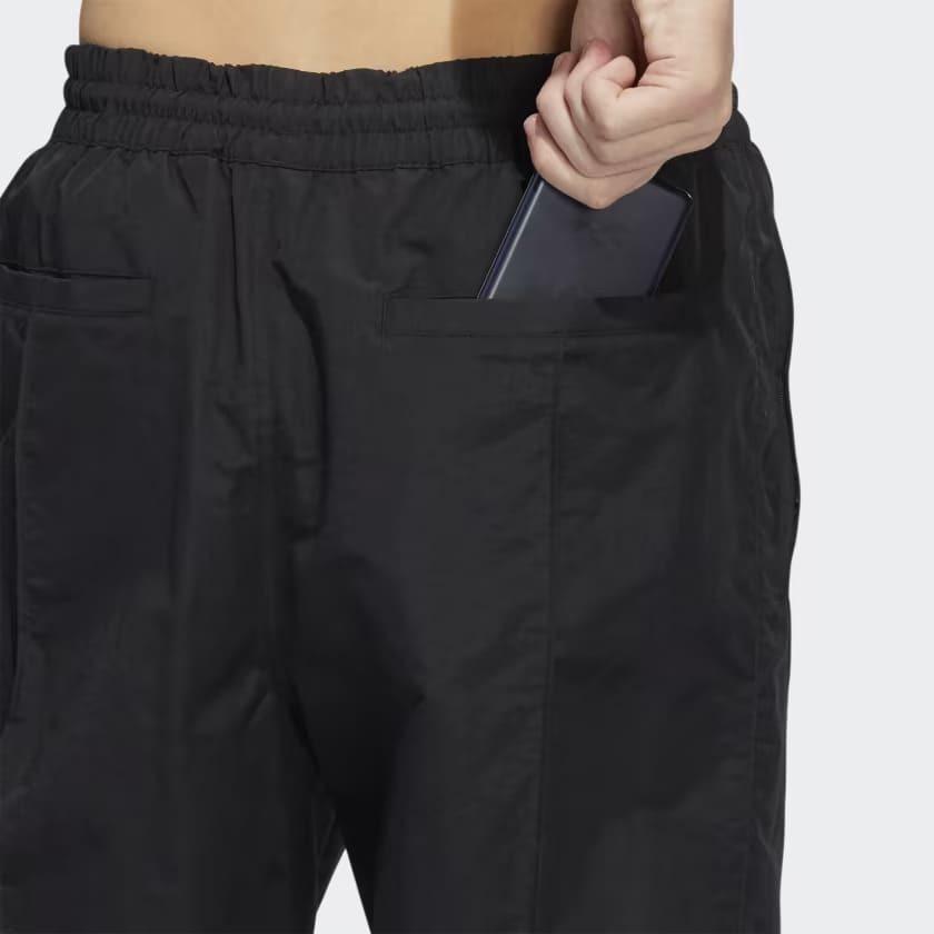 Pantalón Pintuck de género neutro de Adidas