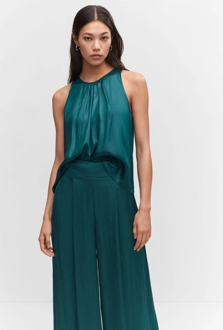 Pantalón de pernera ancha satinado de Mango