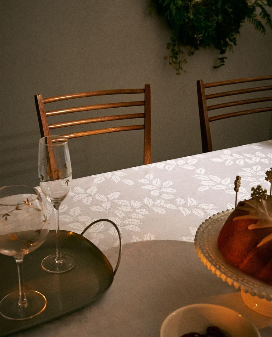 Mantel jacquar con flores de navidad de purpurina