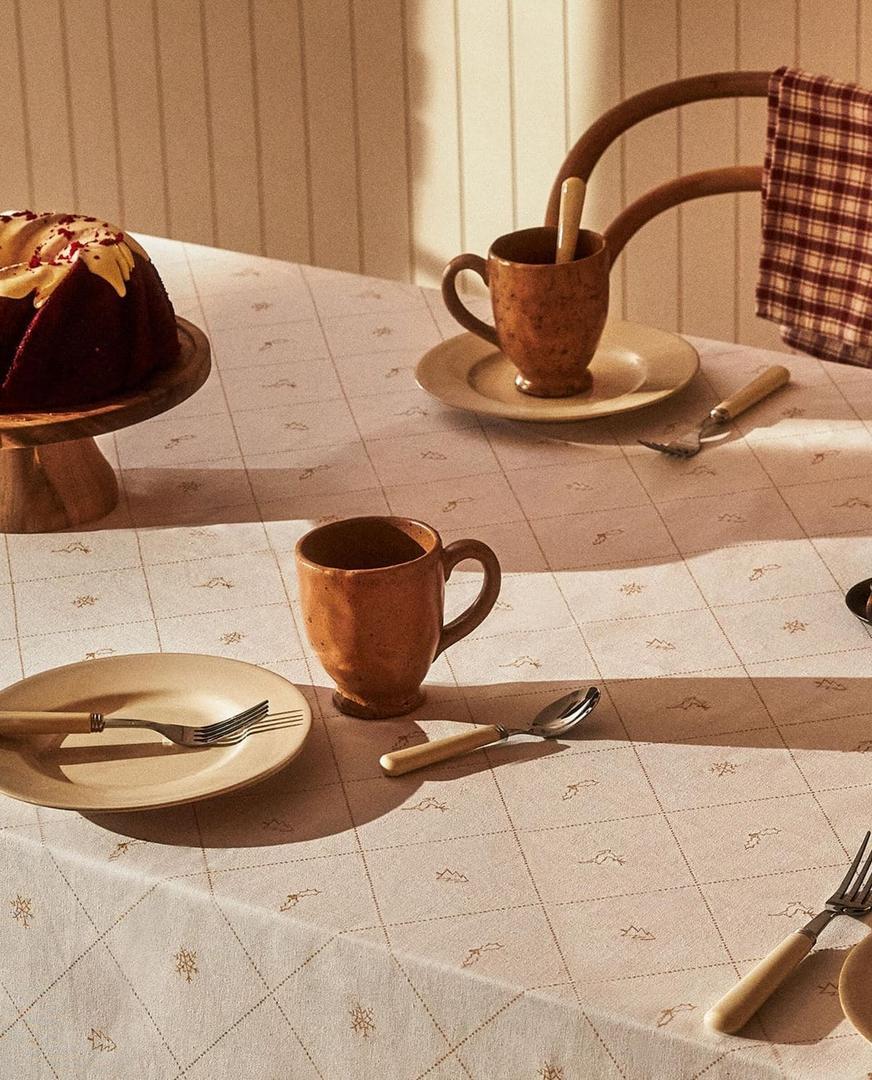 Mantel de algodón nieve con detalle estampado de navidad