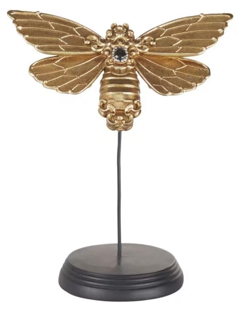 Decoración de mariposa de resina negra y dorada