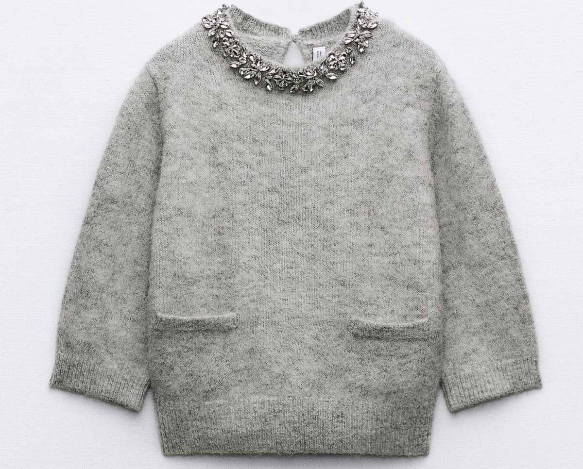 Jersey punto joyas cuello de Zara