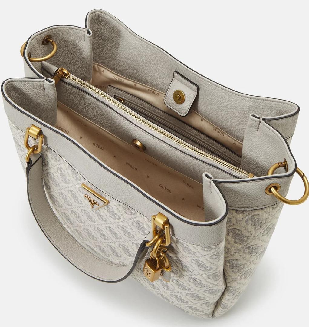 Bolso de hombro Shemara en color blanco con estampado de logos de Guess en El Corte Inglés