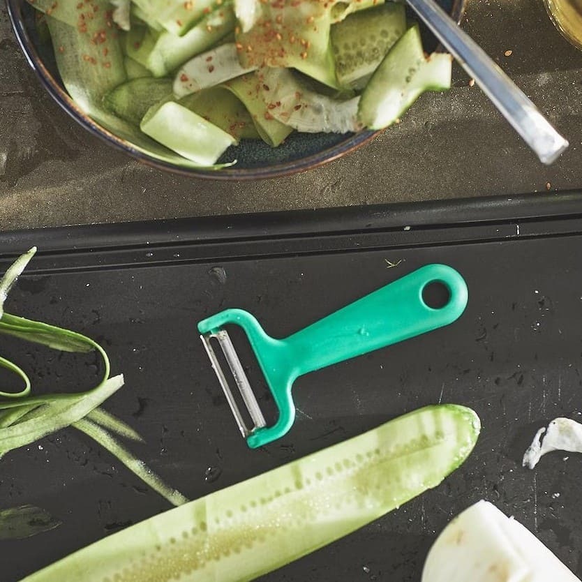 Pelador de frutas y verduras UPPFYLLD