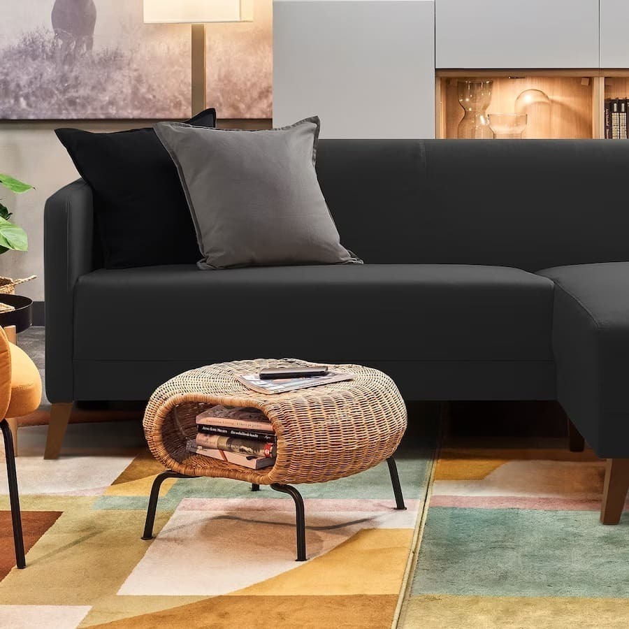 Sofá de tres plazas gris oscuro del modelo LINANÄS con chaise longue de Ikea