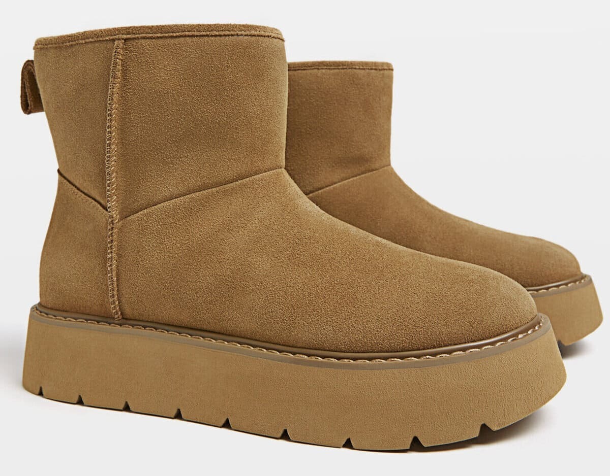 Botines planos con pelo de piel de Stradivarius