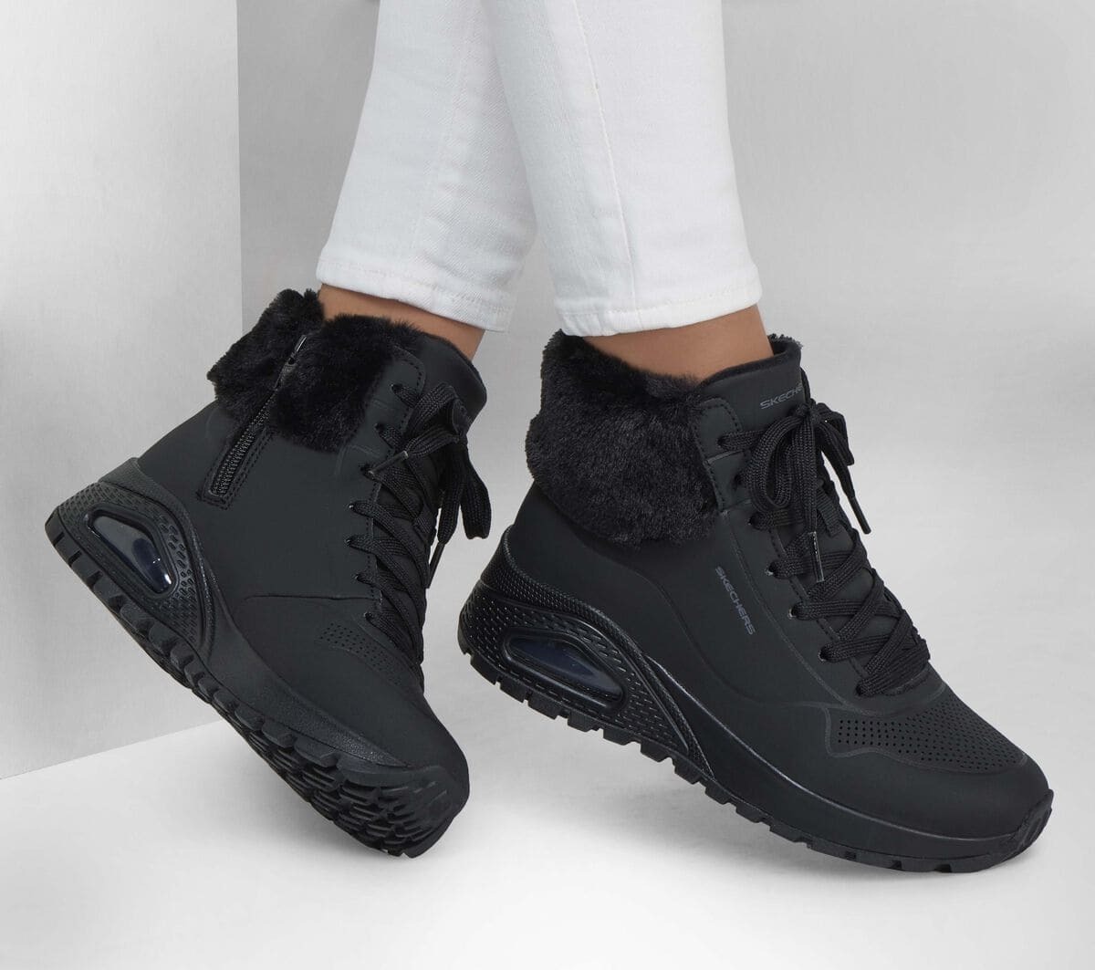 Botas con pelito de Skechers Fall Air de color negro