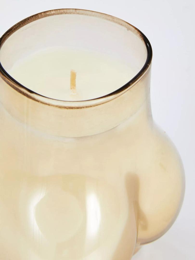 Vela en recipiente de vidrio con forma de escultura de Primark